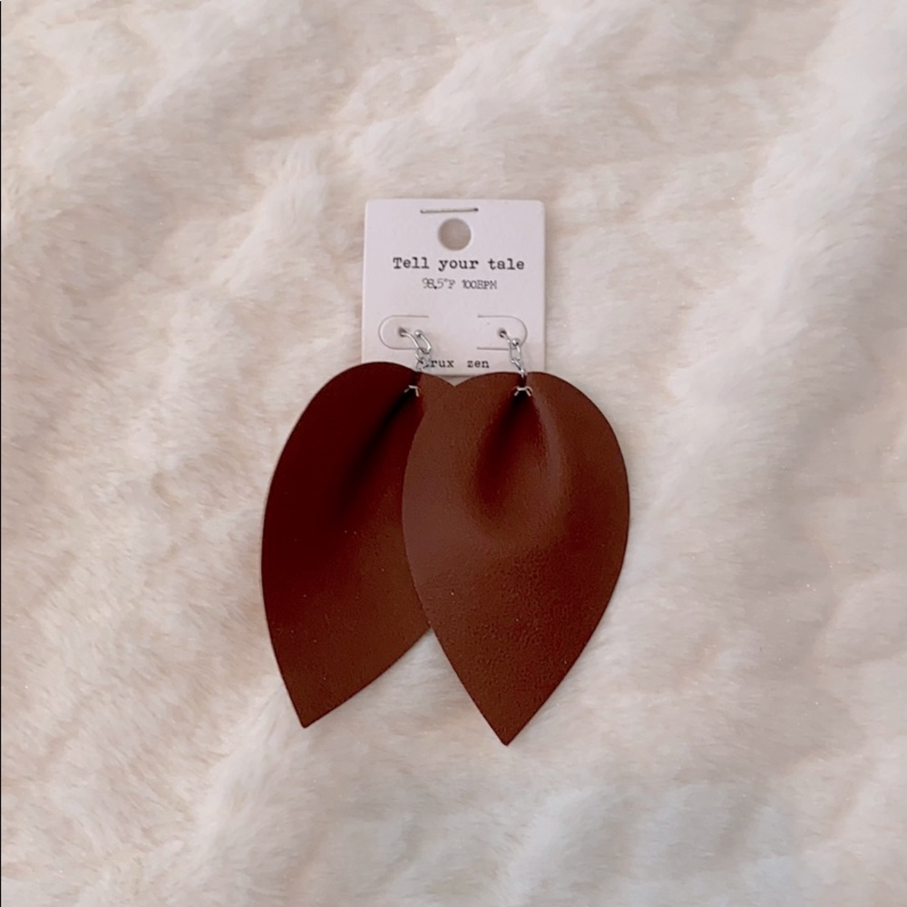 Leather brown earrings never been worn.